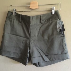 INC olive cuff shorts